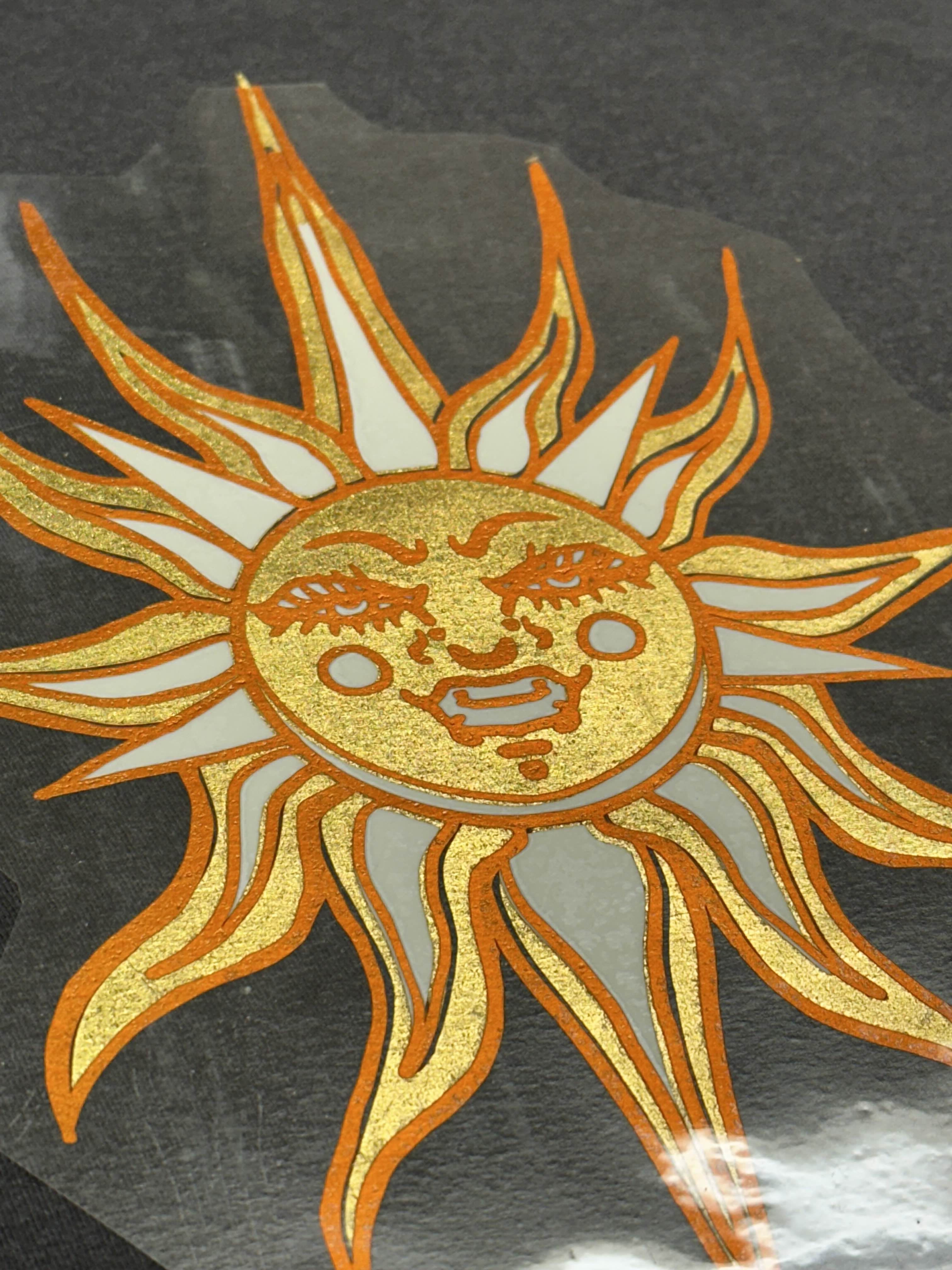 SYG logo vinyl pressed on a sticker sheet